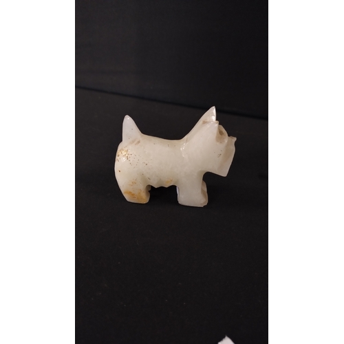 388 - White Quartz Scotty dog measures 6 x 7 cm