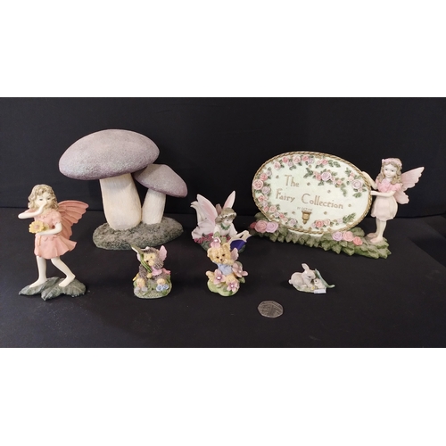 392 - Selection of fairies, glitter topped mushroom and a fairy collection sign