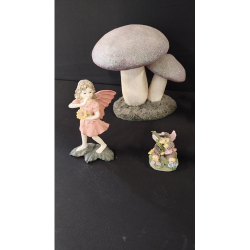 392 - Selection of fairies, glitter topped mushroom and a fairy collection sign