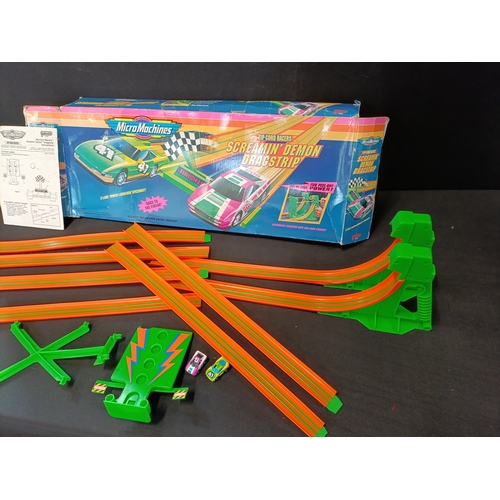 398 - Micro Machines Rip Cord Racers Screaming' Demon Dragstrip toy set