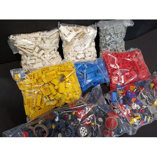 399 - A large quantity of LEGO.  Block and bags of accessories