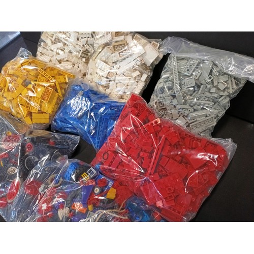 399 - A large quantity of LEGO.  Block and bags of accessories