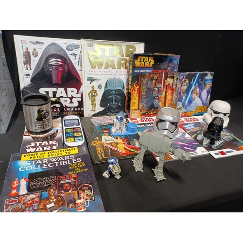 405 - Collection of Star Wars items including books, jigsaw puzzles, sticker books, mugs and toys