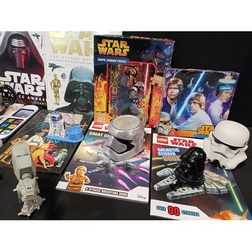 405 - Collection of Star Wars items including books, jigsaw puzzles, sticker books, mugs and toys