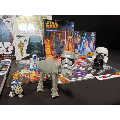 405 - Collection of Star Wars items including books, jigsaw puzzles, sticker books, mugs and toys