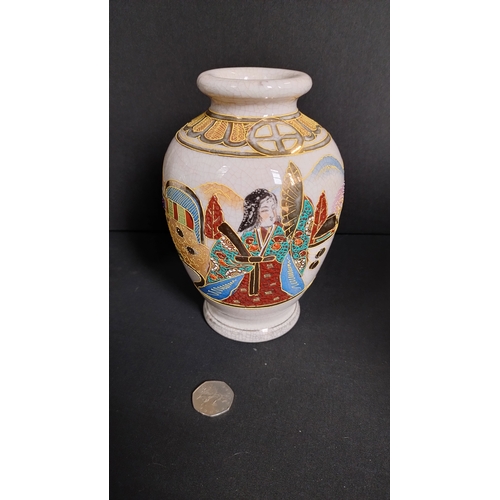 402 - One floral design ginger jar with lid, Sheraton and sons measures 10.5 inches and one  satsuma vase ... 