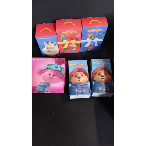 407 - 18 McDonald's unopened happy meal toys, including Pokémon, sonic, Ty, and more