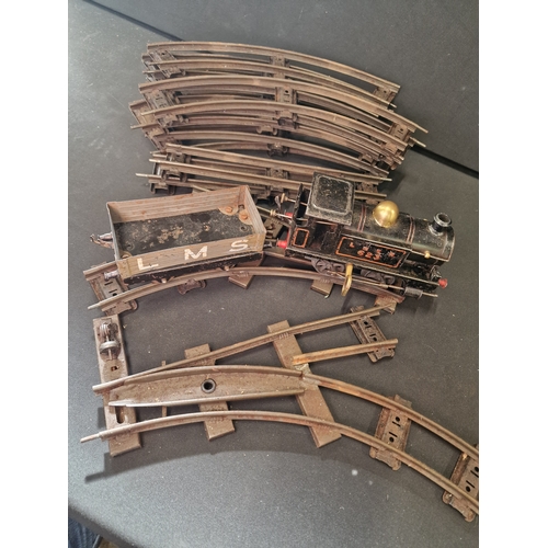 416 - A vintage diecast Hornby train with carriage and track.  Comes with key