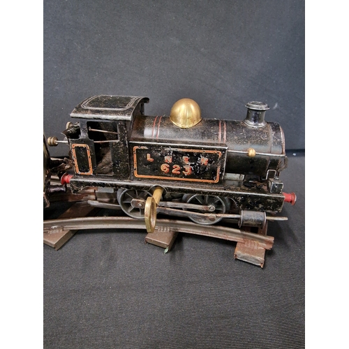 416 - A vintage diecast Hornby train with carriage and track.  Comes with key