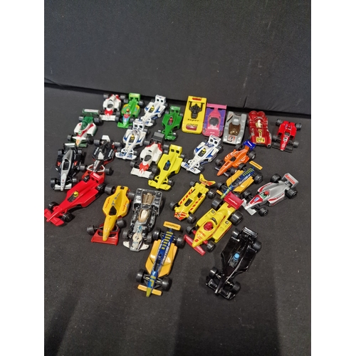 417 - Approximately 26 formula one diecast cars.  Matchbox, mojoeite, corgi juniors and Corgi.