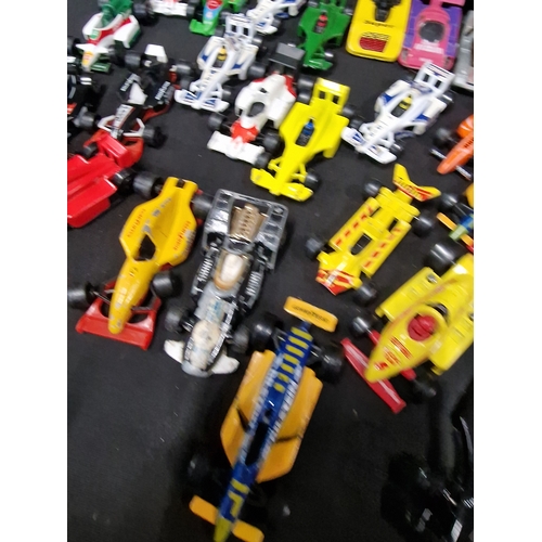 417 - Approximately 26 formula one diecast cars.  Matchbox, mojoeite, corgi juniors and Corgi.