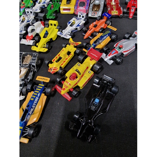 417 - Approximately 26 formula one diecast cars.  Matchbox, mojoeite, corgi juniors and Corgi.