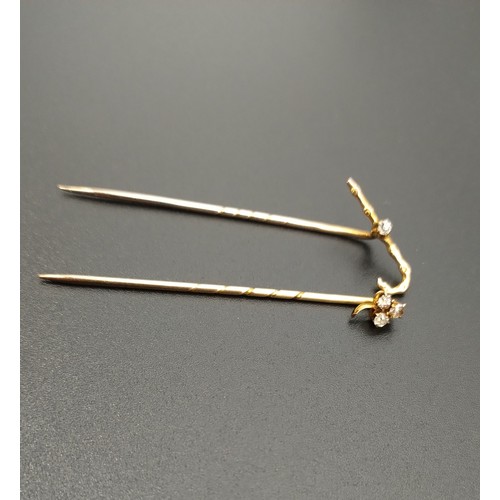 40 - Two ladies lapel / stick pins one 15ct yellow gold and the other unmarked but tests as 10ct