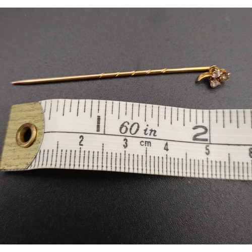 40 - Two ladies lapel / stick pins one 15ct yellow gold and the other unmarked but tests as 10ct