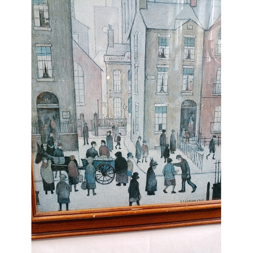 513 - L.S. Lowry print of Hawker's Cart in pine frame