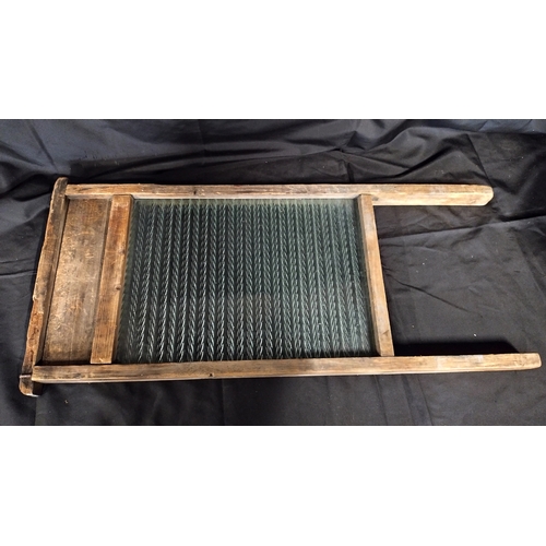 112 - Vintage glass washboard measures approx 28.5 x 13.5