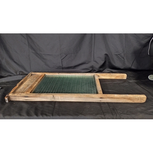 112 - Vintage glass washboard measures approx 28.5 x 13.5