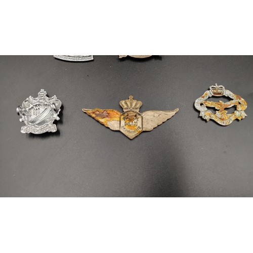 92 - Selection of military and police items including a Royal Scots badge, police badges and more