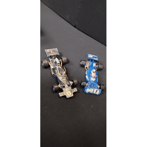 11 - Vintage diecast Racing cars by Corgi, Matchbox. Featuring JPS 1, TYRRELL-Ford elf 1, F1 Benetton,K-7... 