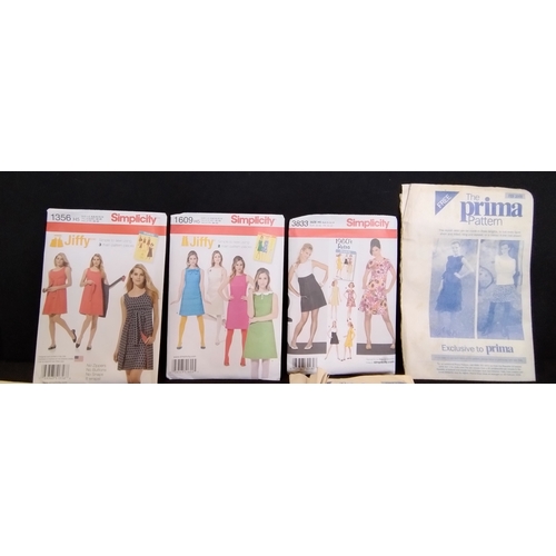 30 - Collection of 10 vintage clothes patterns by Prima. And a pack of Kodak photo paper