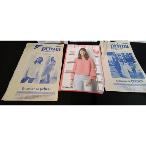 30 - Collection of 10 vintage clothes patterns by Prima. And a pack of Kodak photo paper