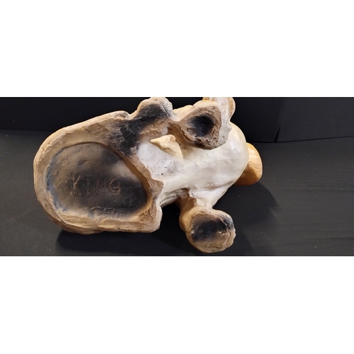 38 - Resin sculpture of a basset hound with king written to the base measures approx H 34 x D 27 x W 49