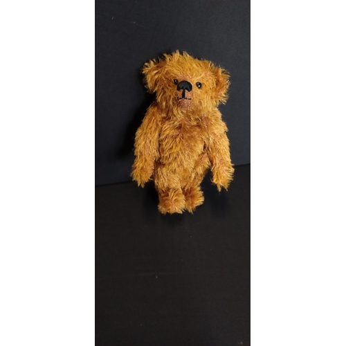 50 - 1995, 100% mohair Suzy bear named Midge 
. Measures approx H 23 cm