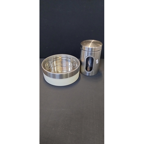 56 - Zeller Stainless steel bread bin with wooden board attached, Butterfly steel cookie tin, and a large... 