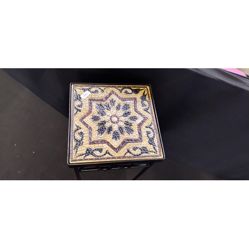 58 - Tall tile topped black metal side table measures approx H 50 x W 20.5