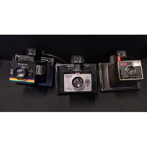 459 - 3 vintage Polaroid cameras