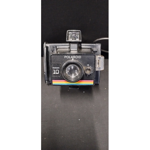 459 - 3 vintage Polaroid cameras