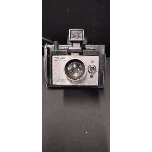 459 - 3 vintage Polaroid cameras