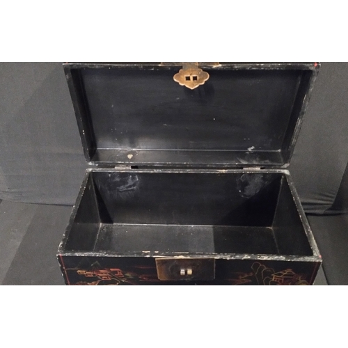 49 - Oriental design chest black and red colourway with a copper latch. Measures approx H 22.5 x W 44 x D... 