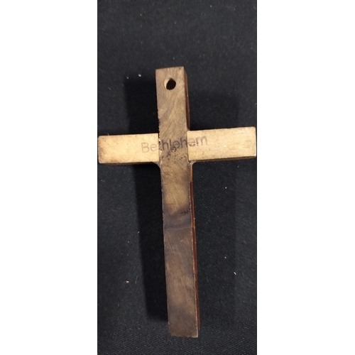 62 - Wooden carved angel measures approx H 21 x W 30 x D 7.5 cm. and a small wooden crucifix with Bethleh... 