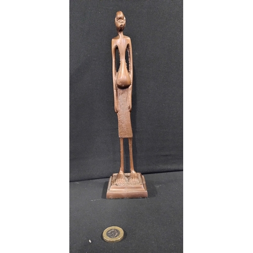 64 - Two African metal figures brass and copper