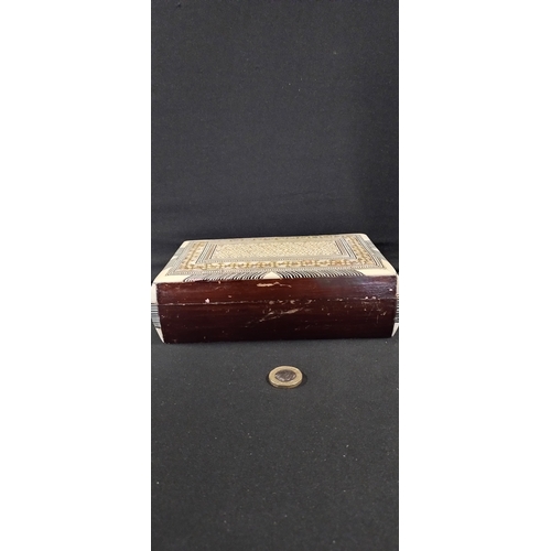 66 - Wooden marketory inlaid box  with mother of pearl and bone and red velvet lining. Measures approx H ... 