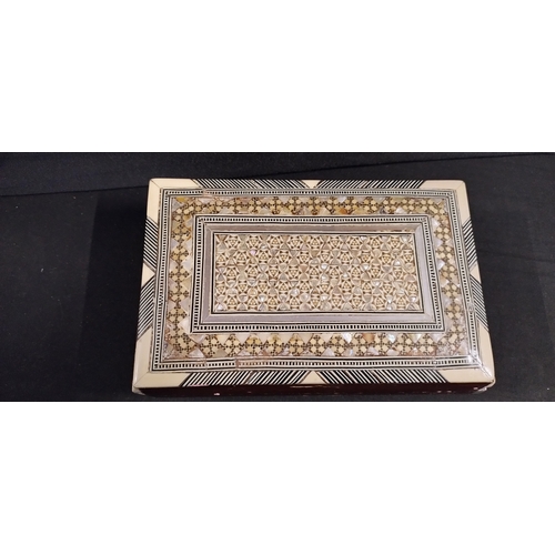 66 - Wooden marketory inlaid box  with mother of pearl and bone and red velvet lining. Measures approx H ... 