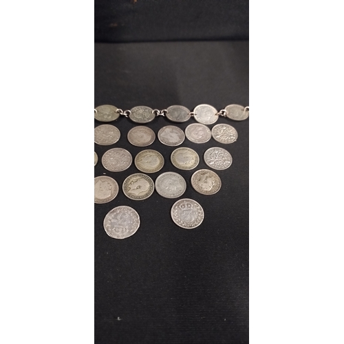 10 - 24 sterling silver coins with a coin bracelet.