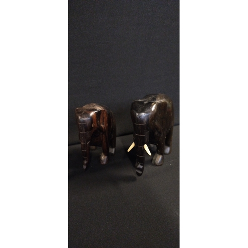 85 - Family of 4 wooden elephants