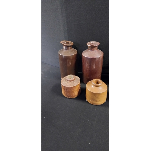 91 - 9 stoneware bottles and pots various sizes and colours