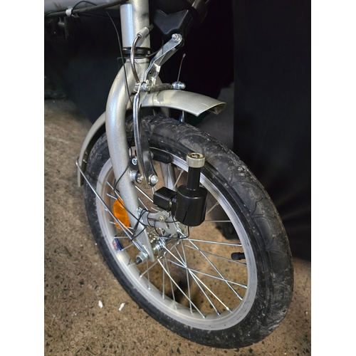 102 - Like new folding bike with storage bag and accessories