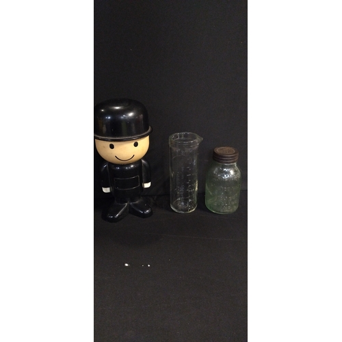 109 - Vintage Horlicks and Ovaltine mixer jars and a Homepride figure