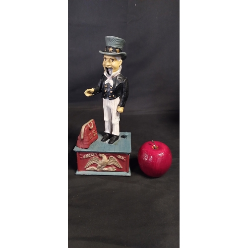 131 - Cast metal Uncle Sam coin bank