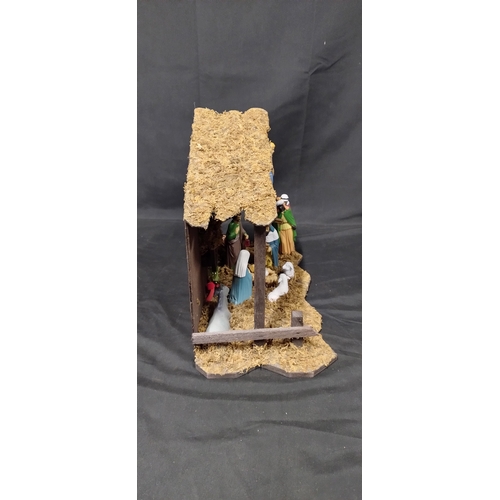 157 - Nativity scene. Measures approx H 30 x W 41 x D 18 cm