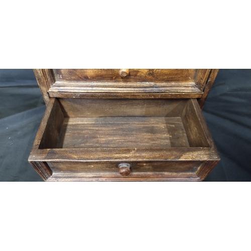 28 - Small distressed solid wooden 3 drawer unit. Measures approx H 35 x W 33.5 x D 20 cm