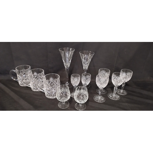 32 - Collection of cut glass including pinwheel wine glasses, tankards and other glasses