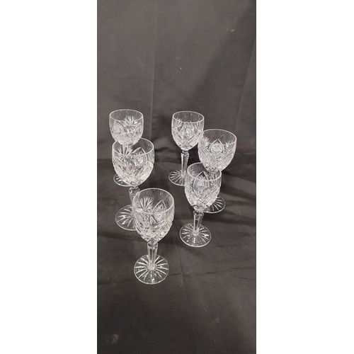 32 - Collection of cut glass including pinwheel wine glasses, tankards and other glasses