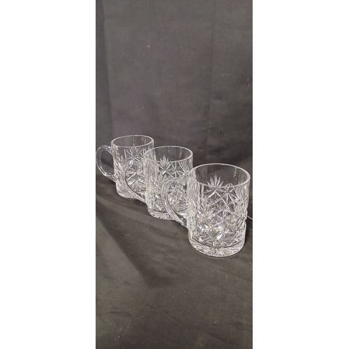 32 - Collection of cut glass including pinwheel wine glasses, tankards and other glasses