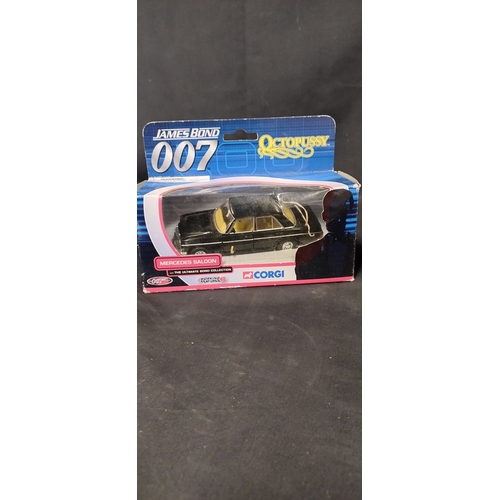 47 - Two Corgi James Bond diecast vehicles Octopussy, Die Another Day and a Deck of James Bond cards, Bla... 