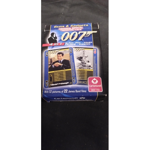 47 - Two Corgi James Bond diecast vehicles Octopussy, Die Another Day and a Deck of James Bond cards, Bla... 